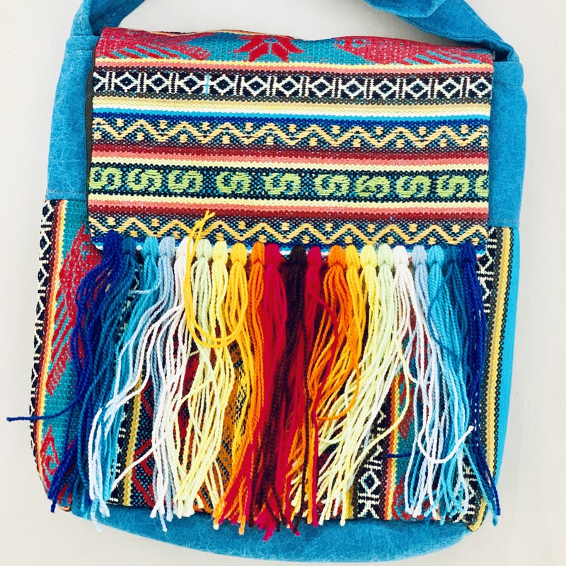 Hand Embroidered Bag with Tassels.